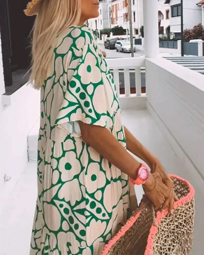 CHRISTINE | Lange Zomerjurk met Vloeiende Snit en Elegante Grafische Motief