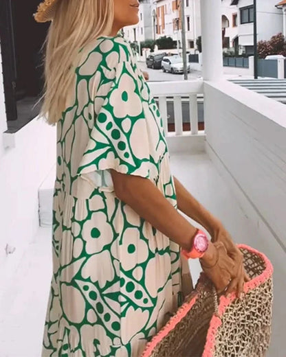 CHRISTINE | Lange Zomerjurk met Vloeiende Snit en Elegante Grafische Motief